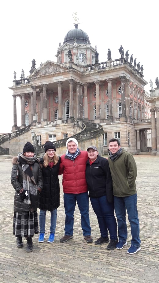 A group of students in front of a building in Germany.