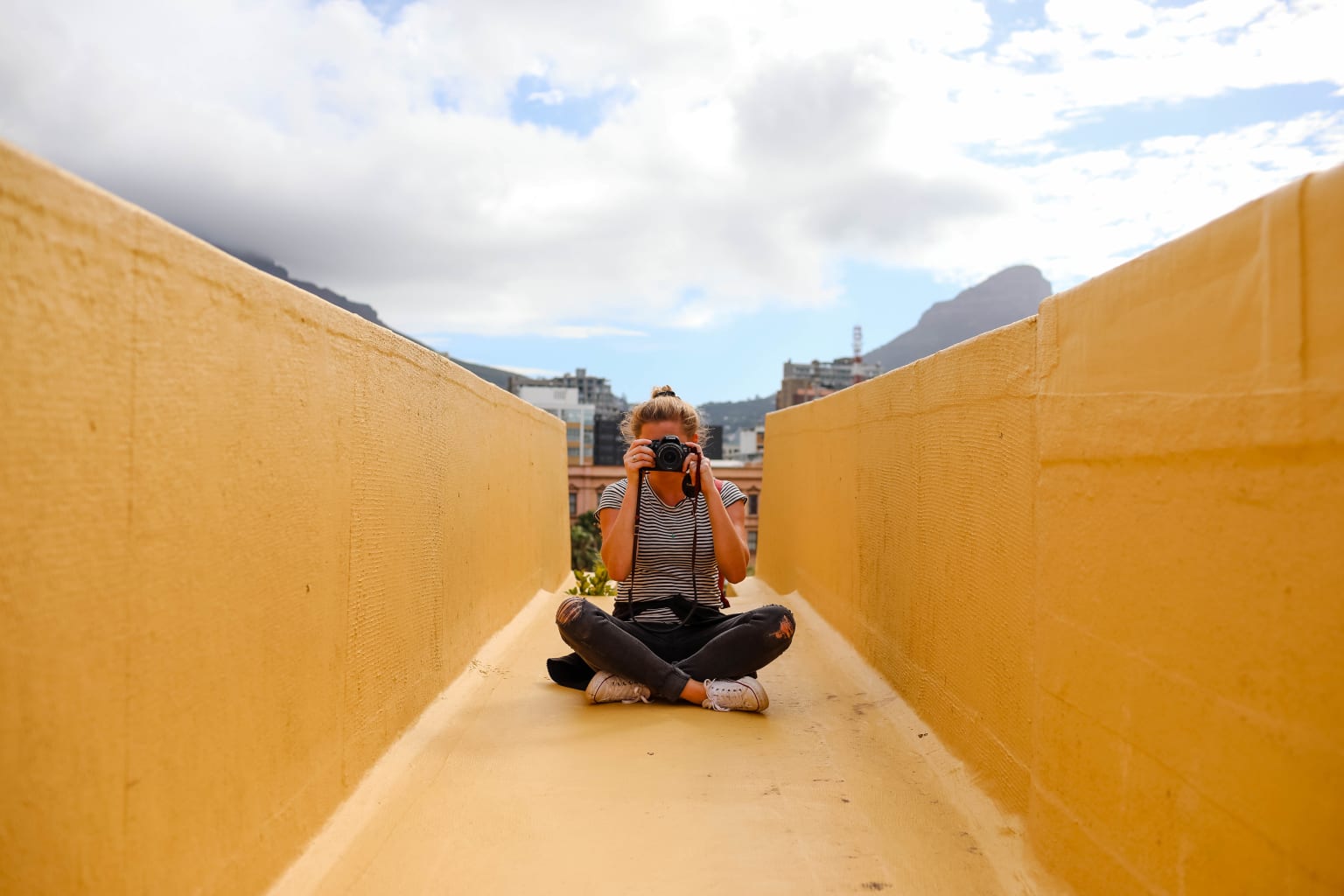 Girl taking a picture.