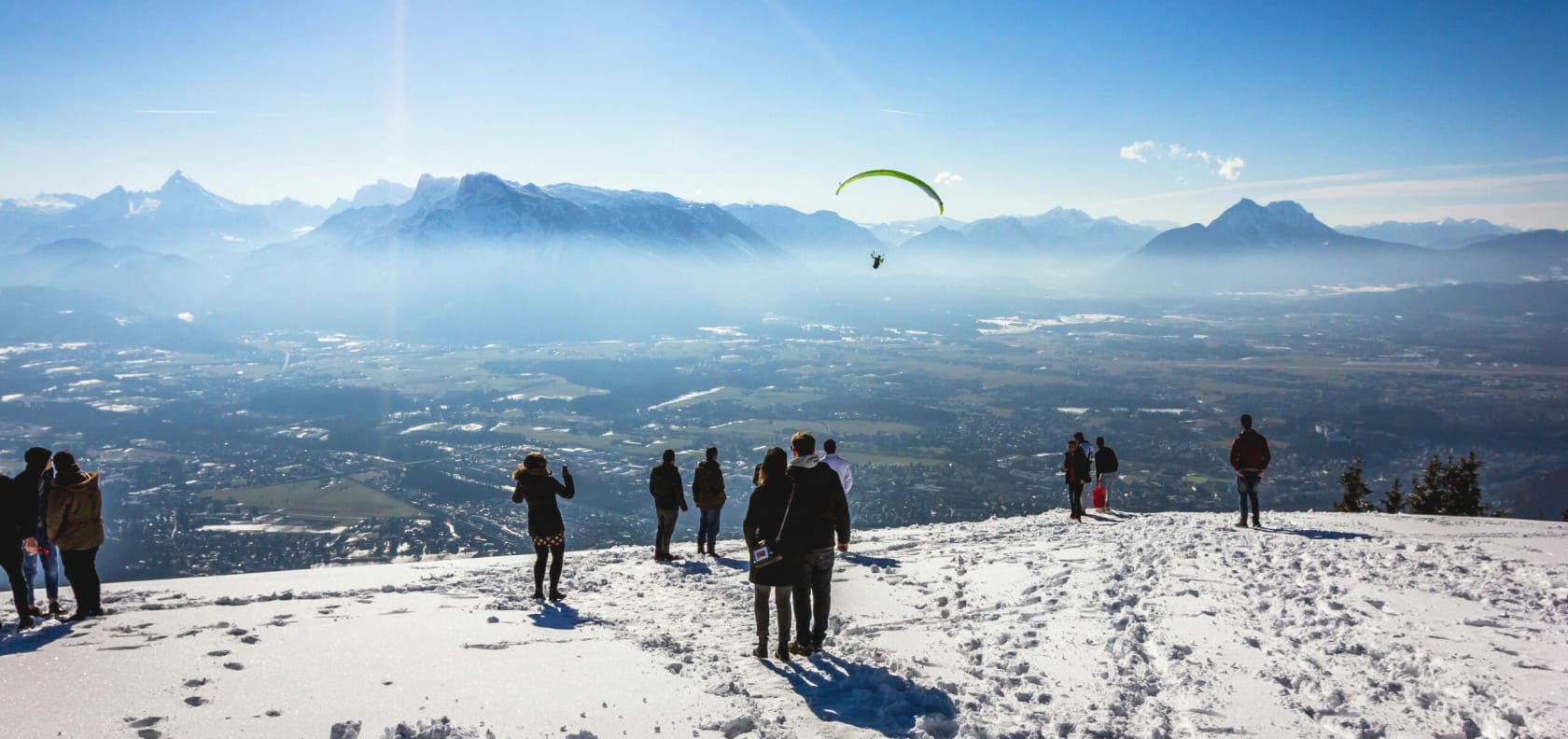 A high landscape with snow, overlooking the city.