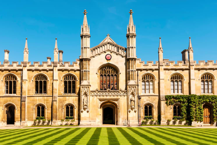 The front of a large castle-like building in Cambridge, England.