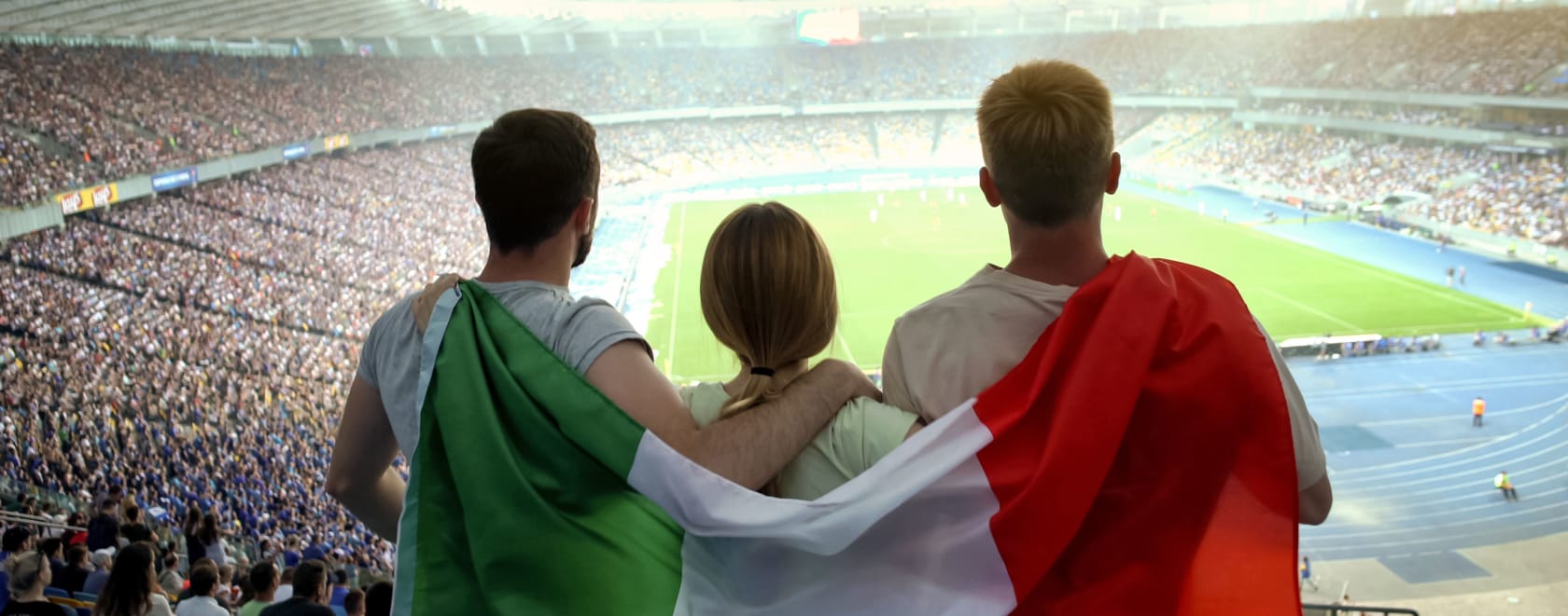 Students watch a soccer match in Florence, Italy.