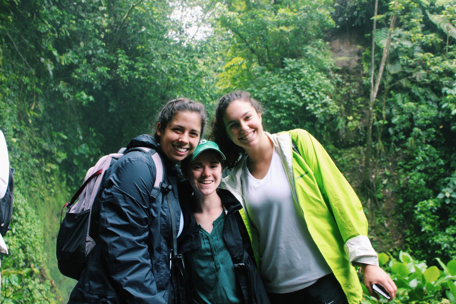 Three girls smiling.