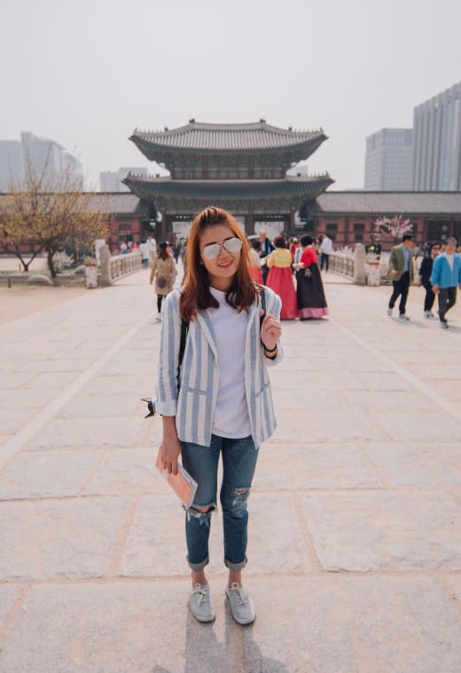 Student traveler at Gyeongbokgung Palace in South Korea.