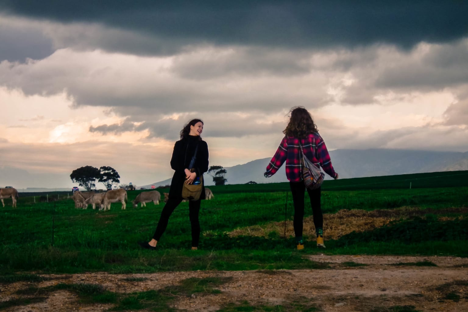 Girls outside in field.