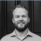 A headshot of Zuora's Jonathan Brown